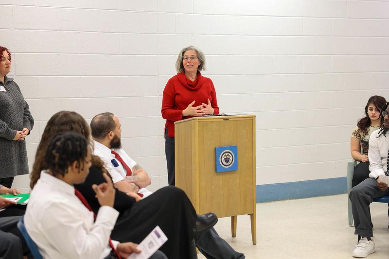 Jennifer Nesbitt speaking at podium